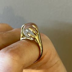 Yellow gold plated ring decorated with a crystal ball. Designer Colin Robertson for the Charles Jourdan brand in the 1980s. 2 sizes currently available: Size 52 FR/ inner diameter 16.7 mm/ US 6 Size 53 FR/ inner diam. 17mm/ US 6.5 Very good condition! Crystal Ball Ring, 2 Hands, Charles Jourdan, Ring Ideas, Plated Ring, Gold Plated Rings, Crystal Ball, Jewelry Rings, Gold Plate