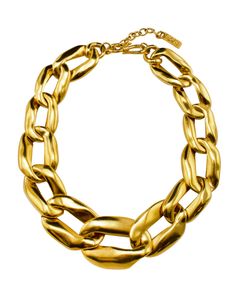 Mid 1980's YSL gilt metal oversized graduated chain link necklace. Adjustable at the back to fit loose or choker style. This is a classic piece of fashion jewelry that Yves Saint Laurent repeated every decade with slight variations. This version has graduated oval shaped links, other iterations come with squared links. In excellent condition, YSL stamped metal tag visible at the back. Original box not included. A great statement piece. Length 16" can be extended to 18". Center link 1.5" decreasi Luxury Vintage Jewelry With Double Chain, Ysl Necklace, Ysl Jewelry, Stamped Metal, Metal Tag, Metal Tags, Closet Organizer, Choker Style, Chain Link Necklace