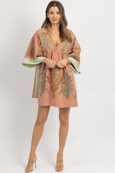 *SIGN UP FOR RESTOCK NOTIFICATIONS, ITEMS ARE RESTOCKED WHEN POSSIBLE BASED ON DEMAND* DESCRIPTION 80% Rayon, 20% Cotton Relaxed mini dress, V-neckline with quarter sleeves, Embroidered detail throughout, Babydoll fit Naomie is wearing a size small Height | 5'8 Dress size | 2 Please note: All items purchased on sale are final sale. We recommend checking your cart for sale items to make note of non-returnable items. Bohemian V-neck Embroidered Dress For Brunch, Summer V-neck Dress With 3/4 Sleeves, Spring Embroidered V-neck Mini Dress, Spring V-neck Embroidered Mini Dress, Floral Embroidered V-neck Mini Dress For Vacation, Floral Embroidery V-neck Mini Dress For Vacation, V-neck Mini Dress With Floral Embroidery For Vacation, Pink V-neck Mini Dress With Floral Embroidery, Floral Embroidered V-neck Mini Dress For Beach