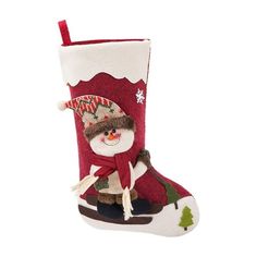 a christmas stocking with a snowman on it's legs and a red hat