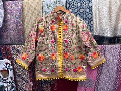 Handmade Item  Indian Women's Phulkari Embroidered Stylish Designer Jacket, Indian Handmade Embroidery Jacket, Traditional Festival Kutch Banjara Jacket Woman's jacket cotton Designer embroidery. This jacket was hand-made with vintage style phulkari embroidery by artisans from the nomadic desert tribe known as "Banjara ", in the Northern India. The Jacket is no closure pattern with Long Sleeves and Vibrant Color Item Detail - Material :- Cotton With Thread Work And Sequence. Length :- 24" Inches Traditional Nehru Jacket With Dabka Work For Spring, Bohemian Multicolor Sets For Fall, Navratri Long Sleeve Traditional Wear, Navratri Traditional Wear With Long Sleeves, Folk Style Outerwear With Intricate Embroidery For Spring, Traditional Wear With Multicolor Intricate Embroidery For Spring, Spring Outerwear With Resham Embroidery, Traditional Embroidered Spring Sets, Bohemian Long Sleeve Sets With Intricate Embroidery