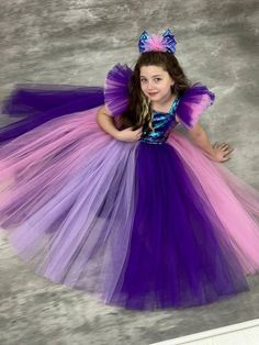 Dive into enchantment with our Mermaid Costume Toddler Dress, the perfect attire for your little one's birthday celebration. This Mermaid Tulle Dress captures the spirit of Ariel's princess charm, making it an ideal choice for an unforgettable birthday party outfit. Key Features: Mermaid Magic: Transform your toddler into an underwater princess with this mermaid costume. Tulle Elegance: Layers of tulle create a whimsical and magical look fit for a little mermaid. Ariel Princess Dress: Inspired b Purple Princess Fairy Dress For Pageant, Purple Princess Fairy Dress In Tulle, Purple Princess Style Fairy Dress For Pageant, Princess Style Purple Tulle Fairy Dress, Birthday Princess Mermaid Dress In Tulle, Tulle Mermaid Princess Dress For Birthday, Mermaid Tulle Princess Dress For Birthday, Whimsical Purple Princess Dress For Pageant, Purple Mermaid Tutu Dress For Dress-up