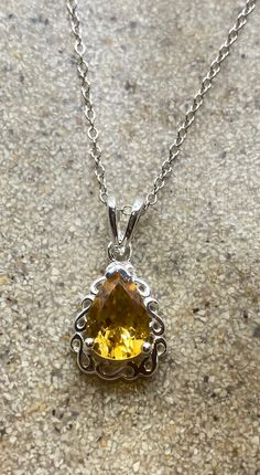 Amazing beautiful statement pendant design Main stone Deep Gold Citrine  and white sapphire  Lovely handmade silver work  92.5% Sterling Silver About 1 inch long 18 inch chain, can be changed for any length All jewelry is shipped in a nice gift box.   Check out our over a THOUSAND great reviews Teardrop Topaz Necklace For Gift, Topaz Drop Jewelry For Gifts, Sterling Silver Necklace With Accent Stones For Gift, Silver Necklaces With Accent Stones For Gifts, Stamped 925 Teardrop Pendant Necklace For Anniversary, Fine Jewelry Silver Citrine Necklace, Silver Citrine Necklace In Fine Jewelry Style, Silver Topaz Necklace With Accent Stones, Silver Teardrop Citrine Jewelry