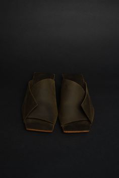 Elevate your style with the Amos slippers, meticulously handcrafted in Peru using premium 100% leather. The exquisite design of these slippers showcases a unique squared sole, striking the perfect balance between fashion and comfort. The supple leather elegantly wraps around the top of the foot, ensuring a snug and stylish fit. The open toe and back design add a touch of sophistication, making them perfect for both casual and formal occasions. With a short heel and a sole measuring 3/4", these s Short Heels, Black Slides, Navy Leather, Leather Slides, Back Design, Navy Color, Pink Leather, Exquisite Design, Peru