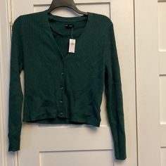 Nwt Gap Skinny Rib V-Neck Cardigan In What They Call "June Bug Green." Smoke-Free Home. Pit To Pit Approximately 20". Shoulder To Hem Approximately 21". Gap V-neck Fall Sweater, Gap Cardigan With Button Closure For Fall, Green V-neck Cardigan For Layering, Gap Sweater For Spring Layering, Gap Button-up Cardigan For Fall, Gap Fall Top With Button Closure, Gap Button Closure Top For Fall, Fall Button Closure Top By Gap, Casual Gap V-neck Sweater