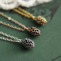 "A perfectly formed single pinecone on a matching fine chain. Each pinecone is antiqued plated and comes with either a Gold Plated, Rose Gold Plated or Silver Plated chain - choose from the drop down menu above. The pinecones measure a dainty 1cm tall (0.4\"). Perfect for those that love Autumn/Fall, and is great to wear with your favourite outfit or to give as a special, thoughtful gift. Choose a necklace length tailored to you (please refer to the necklace length guide)  *Gifts And Treating Yo Large Moonstone Ring, Pinecone Necklace, Pinecone Pendant, Autumn Jewelry, Necklace Length Guide, Idea Gift, Nature Inspired Jewelry, Fall Jewelry, Hand Written