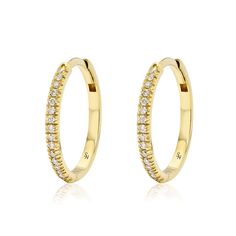 The largest size in our signature huggie series 15 mm Solid 18K Gold 16 round 1.1mm brilliant diamonds on each hoop, VS quality, G/H Color. TCW = 0.16 cts per hoop Hinged opening with hidden post closure Sold as a pair Brilliant Diamond, G H, 18k Gold, Diamonds, Yellow Gold, Gold, Color