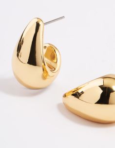 Trendy Teardrop Gold Jewelry, Trendy Gold Teardrop Jewelry, Gold Shiny Finish Drop Earrings, Gold Drop Earrings With Shiny Finish, Trendy Gold Teardrop Earrings, Chic Gold Earrings With Shiny Finish, Gold Modern Teardrop Earrings, Trendy Gold Teardrop Metal Earrings, Trendy Gold Teardrop Hoop Earrings