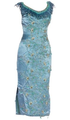 1950s Balmain-style turquoise silk evening gown embroidered with crystals and turquoise beads. No maker label. Available at 1stDibs. Embellished Silk Dress For Banquet, Silk Embellished Dress For Banquet, Embroidered Fitted Evening Dress For Reception, Fitted Embroidered Evening Dress For Reception, Elegant Embroidered Dress With Floral Embroidery For Reception, Festive Elegant Embroidered Evening Dress, Elegant Festive Embroidered Evening Dress, Elegant Embroidered Evening Dress For Festive Occasions, Elegant Floral Embroidered Dress For Reception