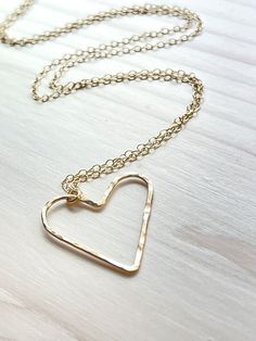 Dainty Gold filled hammered floating heart pendant necklace. Measures 18" in length. An everyday must have. Handmade in the USA. All jewelry items are delivered to you wrapped perfect for gift giving! Love Necklace, Heart Pendant Necklace, Gift Giving, Heart Necklace, Heart Pendant, Gold Filled, Gold Bracelet, Floating, Gold Necklace