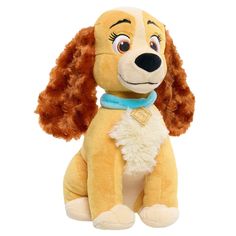 the lady and the tramp plush toy is sitting on its hind legs with a blue scarf around it's neck