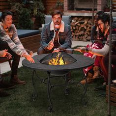 Add warmth to your patio, deck or backyard with this versatile wood burning fire pit table! This round fire pit is ideal for cool nights out on your patio with family or friends, which also can serve as a practical dining table for your indoor activity. Made of heavy duty steel frame with heat-resistant finish, our fire pit table features ex cellent sturdiness and durability. Thanks to its waterproof and rustproof design, you can use it for long-lasting outdoor use in confidence. Plus, the deep Propane Fire Pit Table Patio Decks, Solo Stove Fire Pit Table Backyard, Table Top Fire Pit Wood, Round Fire Pit Dining Table, Outdoor Fireplace Tables, Gas Table Fire Pit, Gas Fire Pit Table Deck, Gas Fire Pit Seating, Fire Pit Dining Table Bbqguys