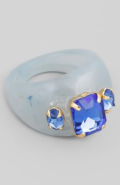 COLOR: BLUE DETAILS Colorful resin acrylic ring with gemstone accents One size, fits 7/8