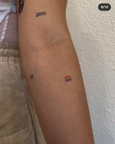 a person with a small tattoo on their arm