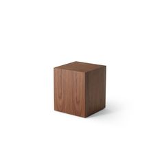 a square wooden object on a white background