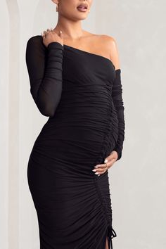 Our "Sweet Dreams" midi dress oozes style and sophistication. This elegant midi is perfect for all events throughout your pregnancy. whether it's for your baby shower or a glam night out the stretch-mesh fabric will flatter your bump whilst keeping you comfortable.Features- Mesh long sleeves- Asymmetrical neckline- Tie up cord detail- Thigh splitSizingModel is 5'9 and wears UK size 8 / US size 4Fit InformationMade from Jersey (95% Polyester 5% Elastane)Total length from top of shoulder: 120cmStretch factor: StretchySKU: CL125303 Stretch Ruched Asymmetrical Dress For Party, Stretch Ruched Asymmetrical Party Dress, Ruched Long Sleeve Asymmetrical Party Dress, Long Sleeve Asymmetrical Party Dress With Ruched Detail, Chic Maternity Midi Dress For Party, Chic Maternity Party Dress, Midi Length, Fitted One Shoulder Maternity Dress, Chic Midi Maternity Dress For Party, Fitted Maternity Dress For Date Night