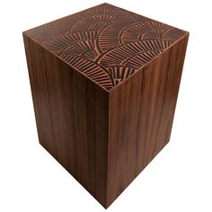 a wooden box with an intricate design on the front and sides, made out of wood