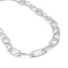 Introducing our Sterling Silver Paperclip Chain—a contemporary twist on a classic design that seamlessly marries simplicity with sophistication. Crafted with precision and passion, this chain redefines the elegance of minimalism, making it a must-have accessory for those who appreciate both subtlety and style. Made from high-quality sterling silver, each link of the paperclip chain is a testament to meticulous craftsmanship. The polished surface reflects light beautifully, creating a subtle yet Modern Everyday Luxury Jewelry With Paperclip Chain, Modern Oval Link Necklace For Everyday Wear, Modern Oval Link Necklace For Everyday, Modern Polished Chain Necklace As Gift, Modern Polished Chain Necklace For Gift, Minimalist Jewelry With Polished Oval Link, Minimalist Link Necklace With Polished Finish, Minimalist Cable Chain Jewelry For Formal Occasions, Elegant Silver Chain Necklace With Polished Finish