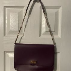 Maroon Kate Spade Shoulder Bag In Perfect/ Brand New Condition. Only Used Twice! Has Three Pockets On The Inside. Beautiful Color For The Fall And Goes With Just About Anything! Let Me Know If You Need More Photos! Feel Free To Make Offers! :) Chic Purple Office Bag, Classic Purple Shoulder Bag With Detachable Handle, Purple Office Crossbody Shoulder Bag, Everyday Purple Shoulder Bag With Gold-tone Hardware, Kate Spade Purple Bags, Purple Office Shoulder Bag With Removable Pouch, Purple Shoulder Bag With Removable Pouch For Office, Purple Clutch Bag For Everyday Use, Chic Kate Spade Pouch Shoulder Bag