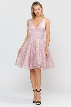 Look radiant in this V-neck cocktail dress with lace skirt by Poly USA 8418. This beautiful short sleeveless dress features a deep V-neckline secured with a sheer inset panel, side pockets, open strappy back, short A-line lace skirt, and a zipper closure. Affordably priced at $129, this short party dress is perfect for any formal event and will keep you on budget! Designer: Poly USA by Ed Young Style Number: 8418 Material: Satin, Lace, Polyester Details: Bra Cup, Fully Lined Fit: The model is 5' Cocktail A-line Evening Dress With Lace Bodice, Elegant Lace V-neck Party Dress, V-neck Scalloped Lace Dress For Prom, V-neck Scalloped Lace Prom Dress, Scalloped Lace V-neck Prom Dress, V-neck Prom Dress With Scalloped Lace, Sleeveless V-neck Dress For Prom Season Cocktail, Evening A-line Sleeveless Lace Dress, Elegant Lace Trim Mini Dress For Homecoming