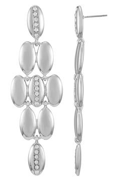 Bring party-ready vibes to any ensemble with these chandelier earrings featuring round-cut crystals and silvertone plating. 2.6" drop; 0.9" width Post back Silvertone plate/glass Imported Modern Silver Metal Crystal Earrings, Modern Silver Crystal Earrings, Crystal Chandelier Earrings, Crystal Chandelier, Chandelier Earrings, Vince Camuto, Round Cut, Nordstrom Rack, Silver Tone