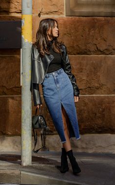 Get ready to elevate your denim game with the Janeve Midi Front Split Denim Skirt in Dark Blue. This pencil skirt is perfect for those who love the casual yet sophisticated look. Made from high-quality denim, this midi skirt features a front split that adds a touch of edge to your outfit. Its dark blue hue makes it perfect for Autumn styling, and its versatile design allows you to dress it up or down effortlessly.The high-waisted fit of this denim skirt accentuates your curves while providing co Trendy Denim Blue Skirt For Fall, Casual Denim Skirt For Winter, Casual Denim Winter Skirt, Trendy Denim Skirt For Fall, Trendy Denim Skirt For Winter, Trendy Medium Wash Skirt For Fall, Trendy Dark Wash Skirt For Fall, Blue Frayed Hem Denim Skirt For Fall, Blue Denim Skirt With Frayed Hem For Fall