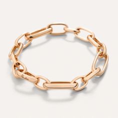 A tribute to Pomellato’s goldsmith heritage, Iconica shines bold in bracelets of rose gold. Daring, lightweight and stackable, this anniversary collection may be mixed-and-matched per the Pomellato spirit. MATERIAL: 18k Rose Gold SIZE: M LENGHT: 16.5 cm Rose Gold 18k - Gold takes its name from the Indo-European word “gehl” meaning to shine. Rose - a delicate tint achieved by mixing gold with small quantities of copper and silver. Every Pomellato jewel is made to be worn every day and on every occasion. This is why no extraordinary maintenance is needed, especially if it is delicately handled and cleaned. If you want to preserve the shine of Pomellato jewelry, we recommend you to store it in a clean, dry place away from any heat sources. REF: PBB7127_O7000_00000 Timeless Rose Gold Chain Bracelet For Everyday, Everyday Rose Gold Bracelet With Polished Finish, Classic Rose Gold Bracelets With Solid Link Construction, Modern Rose Gold Jewelry With Cable Chain, Timeless Rose Gold Tarnish-resistant Chain Bracelet, Timeless Rose Gold Jubilee Chain Bracelet, Classic Polished Rose Gold Chain Bracelet, Modern 14k Rose Gold Chain Bracelet, Classic Rose Gold Chain Bracelet With Polished Finish