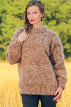 Ready to ship mohair sweater by SuperTanya Brand:  SuperTanya; Style: hand knitted mohair sweater; Material: premium class mohair; Color: Brown and beige; Design: Plain design mohair sweater; Size L-XL Body length, measured from the shoulder top to the bottom end: 27.6" / 70 cm; Chest width, measured at the back, between the underarms: 21.7″ / 55 cm; Sleeve length, measured from the neckline to the end of the cuff: 27.6″ / 70 cm Net weight: 0.830 kg. The lady modeling is 5'8'' (174 cm) tall, bus Beige Mohair Sweater For Fall, Cozy Brown Mohair Sweater, Beige Mohair Winter Sweater, Beige Mohair Long Sleeve Sweater, Beige Mohair Soft Knit Sweater, Brown Alpaca Crew Neck Sweater, Brown Mohair Knitted Sweater, Hand Knitted Mohair Sweater In Beige, Cozy Mohair Crew Neck Sweater