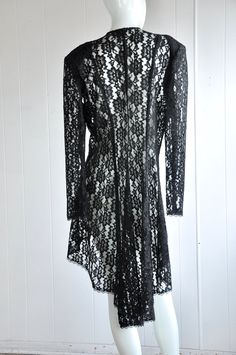 "A gorgeous 2-piece dress and jacket featuring sequins, beads, and lace. The jacket has a hidden eye and hook closure. There are two front panels that end in beads. Has shoulder pads. Brand is Dollar. Vintage size 17. Seems suited for a modern-day large, but please see below for accurate fit. CONDITION: Wonderful. No flaws to note. MEASUREMENTS JACKET Bust: 44\" Waist: 34\" Length: 46\" Shoulder span: 18\" Sleeve: 25\" DRESS Bust: 38\" Waist: 34\" Hips: 40\" Length: approx. 38\" Have a question? Gothic Lace Dress For Party, Gothic Fitted Lace Dress For Parties, Gothic Lace Dress For Evening, Gothic Lace Party Dress, Fall Wedding Lace Dress Fitted, Fitted Party Dress With Lace Collar, Party Lace Dress With Long Sleeves And Lace Collar, Long Sleeve Lace Dress With Lace Collar For Party, Fitted Lace Dress With Patchwork For Fall