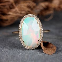 "\"Details: Item code :- ATR-2383 - 14K yellow solid gold (as shown) wt :1.26 gm - 0.17 ct diamonds - 1.96 ct opal - Ring size 17x12 mm & ring size 7 us Anjis touch jewelry supports ethical and eco-friendly practices and uses reclaimed and recycled metals whenever possible About my jewelry: All of the Anjis touch jewelry collection is handmade exclusively by me.  I hope that you will enjoy wearing my designs as much as I enjoy making them! Shipping: We have this in stock which we can ship in 2-3 Jewelry Friendship, Yellow Gold Cocktail Ring, Boulder Opal Ring, Ethiopian Opal Ring, Cocktail Jewelry, Fine Diamond Jewelry, Gold Cocktail Ring, Old Bridge, Handmade Fine Jewelry