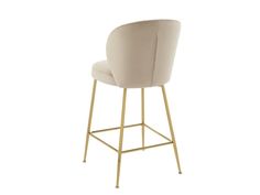 an upholstered bar stool with gold legs and a beige seat, against a white background