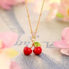 Selenichast Strawberry Fruits Pendant Charm Enamel Long Summer Necklace Jewelry. This strawberry enamel necklace simple yet unique and sleek. These delicate fresh strawberry pendants that seem to give off a delicious scent can deliver you a positive mood and make you look as sweet as fresh fruit.The chain is adorned with gold plated metal beads. Pick up one or more you like and pair it with rings, earrings or fine bracelets from the same set to compliment your outfits. DETAILS Plating: 18K Gold Trendy Adjustable Cherry Jewelry, Cherry Necklaces, Pearl Cherry Necklace, Gold Pendant Necklace Jewellery, Gold Cherry Necklace, Cherry Charm, Cherry Necklace, Jewelry Wishlist, Fresh Cherry