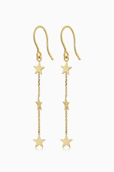 Three gold stars dangle stationed along a delicate chain to create a startling effect. Full of luster and shine, our Starry Night Drop Earrings are ready to brighten up your every day. 14k Solid Yellow Gold 1.75 Inches Long 0.75 Grams Solid Gold French Hooks Crafted in Vicenza, Italy Elegant Yellow Gold Earrings With Star Charm, Elegant Star-shaped Jewelry With Dangling Charms, Vicenza Italy, Handmade Ideas, Delicate Chain, Diy Earrings, Gold Stars, Solid Yellow, Earrings Handmade