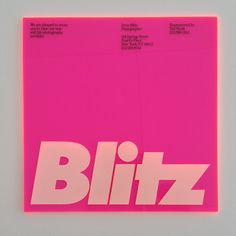 a pink piece of paper with the word biltz on it in white letters