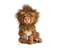 a small child wearing a lion costume