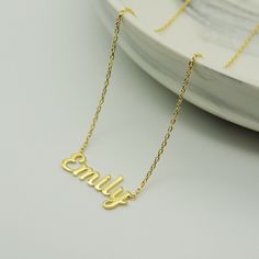 "14k Gold Name Necklace * Custom Name Necklace * Material : 14k Solid Gold - 8k Solid Gold * Finish : White Gold - Yellow Gold - Rose Gold * Production Method : Laser and handmade processes * Lenght: Adjustable Between 14 inch - 22 inch *Lowercase Height : 5 mm A Necklace that your neck will seriously loveee. This name necklace is perfect for everyday. * 100% Handmade for your size * All jewelry comes in beautiful packaging, gift ready. * All items are made to order in Turkey. * Our current proc Yellow Gold Custom Name Necklace For Everyday, Everyday Yellow Gold Custom Name Necklace, Personalized 14k Gold Delicate Chain Necklace, Dainty 14k Gold Personalized Gift Necklace, Dainty 14k Gold Necklace For Personalized Gift, 14k Gold Filled Yellow Gold Necklace For Personalized Gift, Personalized 14k Gold Delicate Chain Jewelry, Everyday 14k Gold Tarnish Resistant Name Necklace, Minimalist Sterling Silver Tarnish-resistant Name Necklace