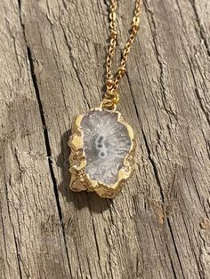 "Stunning gold plated sliced druzy pendant necklace on tarnish resistant 18k Gold Plated Chain. The best part about this necklace is that it is one-of-a-kind, no two druzy pendants are the same! If you're looking for a unique gift for either yourself or someone else this is it!  Please choose chain length and chain style upon checkout (pendant will add an additional .5\" in length). Care Instructions: remove necklace when showering, swimming or working out.  Store it in the packaging it comes in Gold Geodes With Natural Stones As Gift, Elegant Gold Geodes With Natural Stones, Elegant Gold Geodes For Gift, Druzy Pendant Necklace, Raw Turquoise, Gemstone Stud Earrings, Gemstone Studs, Newport Beach, Gold Plated Chains