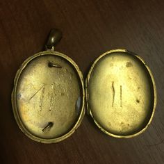 "Lovely antique etched and applied decoration Victorian locket with turquoise painted trim around the raised piece. Locket measures a hair over 2\" in Length(including loop) X 1 1/4\" in Width X almost 1/2\" thick. Hard to get exact thickness, but as you can see in photos the locket is very thick. The detail on this peice is really exquisite, that is what makes it soooo special! Made around the 1860's and in excellent antique condition for it's age. The gold filled is worn on back from wear, fro Ancient Style Yellow Gold Brass Jewelry, Ancient Ceremonial Hallmarked Jewelry, Collectible Ancient Style Yellow Gold Jewelry, Ancient Style Collectible Yellow Gold Jewelry, Ancient Yellow Gold Jewelry For Collectors, Antique Coin Jewelry Gift, Engraved Brass Coin Jewelry, Engraved Coin-shaped Brass Jewelry, Ancient Style Gold Ceremonial Jewelry