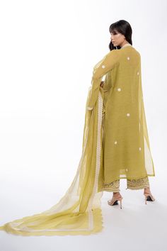 Lila (B) Green Traditional Wear With Gota Work For Spring, Spring Green Traditional Wear With Gota Work, Pista Green Cotton Silk Kurta With Dupatta, Pista Green Kurta With Dupatta In Cotton Silk, Pista Green Chanderi Kurta With Sheer Dupatta, Spring Salwar Kameez With Gota Work And Long Sleeves, Spring Long Sleeve Salwar Kameez With Gota Work, Pista Green Chikankari Anarkali Set In Raw Silk, Pista Green Raw Silk Anarkali Set With Chikankari