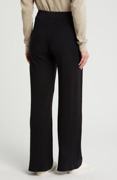 Relax in easygoing style in these soft and stretchy cotton lounge pants cut in a wide-leg silhouette. 100% cotton Machine wash, tumble dry Imported Comfort Stretch Wide Leg Lounge Pants, Wide Leg Comfort Stretch Pants For Lounging, Comfort Stretch Wide Leg Pants For Lounging, Cotton Wide Leg Pants With Ribbed Waistband, Comfort Stretch Wide Leg Pants For Loungewear, Solid Color Wide Leg Lounging Bottoms, Comfortable Full-length Workwear Bottoms, Comfortable Wide Leg Pants For Everyday, Cotton Stretch Wide Leg Pants With Ribbed Waistband