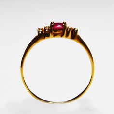 Natural Red Ruby Anniversary Ring {Natural African Treated Ruby} Pigeon Blood Ruby Dimension Of the stones {Ruby} : 4 x 5 mm Oval Shape 0.45 Ct total weight of the stones Secondary Stones : Natural White Zircon {8 Pcs 1.3mm Round } Whole Ring Weight : 1.56 g . Ring Size : UK O1/2, US 8 . Handcrafted with solid 9 K fine Gold . The band for Girl/Women individually hand-set with 4x5 mm size stone Oval shaped Natural Ruby July Birthstone birthstone . Total 9 Gemstones - Cluster Setting . This Ruby 9K Beautiful ring is timeless and stylish. Every piece passes rigorous inspection. So you can buy with confidence. A fantastic gift for Engagement, Anniversary Gift, Christmas's Day, Birthdays, Graduation, Valentine's Day,Mother's Day If you have any question please message us . Thanks for stopping u Ruby Rings For Promise With Round Band, Ruby Rings With Brilliant Cut For Promise, Ruby Ring With Prong Setting For Promise, Ruby Open Ring For Promise, Open Ruby Ring With Prong Setting For Anniversary, Ruby Promise Ring With Prong Setting, Ruby Promise Ring With Round Band, Ruby Diamond Ring With Prong Setting And Open Design, Anniversary Ruby Crystal Ring In Yellow Gold