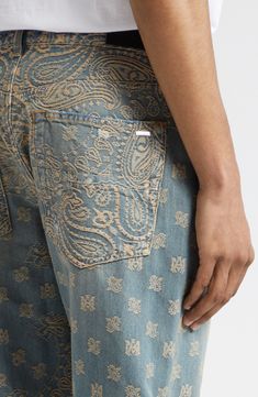 The label's signature paisley pattern is jacquard-woven into the nonstretch denim of these straight-leg jeans lent a broken-in look via distressed patches. 33 1/2" inseam; 16" leg opening; 11 1/2" front rise; 15" back rise (size 29) Zip fly with button closure Five-pocket style 100% cotton Dry clean Made in the USA Designer Clothing Etro Paisley Jeans, Custom Jeans Men Street Styles, Edgy Mens Outfits, Paisley Streetwear, Patches On Denim, Paisley Design Pattern, Textured Clothing, Patches On Jeans, Jean Designs