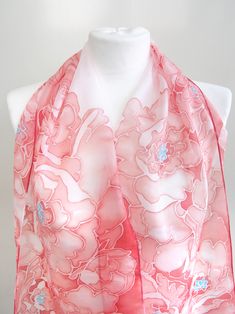 Coral Peonies on silk scarf were hand painted with pastel red and just a tiny bit of baby blue. Size: 49 x 11 inches (which translates to 128 x 28 centimeters) Silk: pure Habotai Light, translucent, delicate and a bit glossy This scarf is painted with a pastel red color set: Indian red, Persian red and salmon. Think of the coral stone! I've also added just a bit of baby blue as an accent, making the composition more intriguing. The scarf is decorated with a design of Peony flowers. Because the s Red Floral Print Silk Scarf For Spring, Red Floral Print Silk Scarf For Summer, Red Floral Print Silk Scarf As Gift, Red Floral Print Silk Scarf As A Gift, Red Scarves As Spring Gifts, Red Scarf For Spring Gift, Red Scarf As A Spring Gift, Red Scarves For Spring Gifts, Pastel Red Color