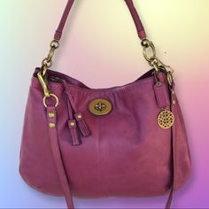 Beautiful Vibrant Plum Color Soft Leather Xl Slouchy Hobo With Vintage Brass Hardware. Extra Large Size With Deep Seen Of The Finest Leather, And Three Ways To Wear, By Handle, Over The Shoulder Or Crossbody. Inside Zip Pocket, Cellphone, And Multifunction Pockets. Center Zip Compartment, Sheen Fabric Lining (Free Of Pen Marks, Dirt, And Grime, But Does Have Some Plum Leather Rubbing Marks, Please See Photos). Detachable Strap For Shoulder Or Crossbody Wear. Handle Drops Approximately 9". Approximate Size - 18" L X 14" T X 3.5" Deep In Excellent Preowned Condition With Minimal Wear Signs. Exterior Imperfections Are Noted In Photos. Please See Photos For Complete Details. Smoke F Elegant Coach Hobo Bag With Silver-tone Hardware, Luxury Coach Hobo Bag With Gold-tone Hardware, Coach Hobo Shoulder Bag With Silver-tone Hardware, Coach Hobo Shoulder Bag With Gold-tone Hardware, Everyday Purple Shoulder Bag With Gold-tone Hardware, Plum Color, Brass Hardware, Purple Gold, Hobo Bag