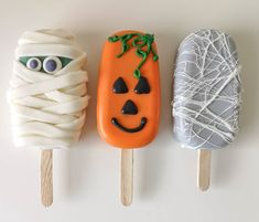 three pops decorated to look like halloween treats