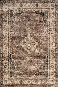 an area rug with brown and beige colors