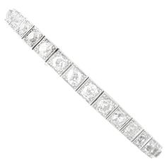 A stunning, fine and impressive antique Old cut 7.85 carat diamond and 18 karat white gold, palladium set bracelet; part of our diverse antique diamond bracelets collection. This stunning, fine and impressive antique diamond bracelet has been crafted in 18k white gold with a palladium setting. This impressive antique bracelet is composed with nineteen Old European round cut diamonds, totalling 7.85cts, individually pavé set to millegrain decorated square links. The bracelet secures with a push f Vintage Platinum Diamond Bracelet With Single Cut Diamonds, Vintage Diamond Bracelet With Brilliant Cut For Formal Occasions, Art Deco Formal Tennis Bracelet With Brilliant Cut, Formal Art Deco Tennis Bracelet With Brilliant Cut, Formal Art Deco Brilliant Cut Tennis Bracelet, Vintage Formal Tennis Bracelet With Single Cut Diamonds, Classic Platinum Diamond Bracelet With Single Cut Diamonds, Timeless Platinum Diamond Bracelet With Single Cut Diamonds, Formal Diamond Bracelet With Rose Cut Diamonds