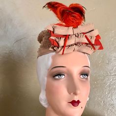 This Highly Unusual 1930s' Hat Consists Of A Cap Made Of Carefully Fringed Beige Felt Strips, Creating A Most Unusual Crown, Ending With Orange Felt Bows Under 3 Beige Fringed Bows At The Center Front, Which Hold Two Criss-Crossed Orange Feathers. By The Early 1930’s Crowns Became Shallow Once Again To Accommodate The Decade’s Fuller Curled Hairstyles. Made By The Merrimac Hat Company. Felt Imprint: Made In Usa Merrimac Hat Corp. The Merrimac Hat Company Was A Prominent Manufacturer Of Hats From The 1860s Until The 1950s, Employing Up To 500 People In Its Manufacturing Facilities In Amesbury, Massachusetts And Another 1,500 In Facilities From Alabama To Nova Scotia.This Hat Was Made To B Amesbury Massachusetts, 1930s Hats, Vintage Straw Hat, Black Fedora Hat, Ostrich Feather Trim, Beige Hat, Safari Animal Prints, Felt Bows, Wool Fedora