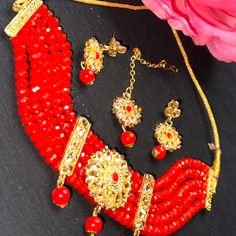 Brand New 4 Pcs Choker, Earrings, Tikka. Gorgeous Red Beaded & Gold Plated Round Shaped Work On. Perfect For Any Occasion & Outfit. Never Got Chance To Wear It. New Are Before. Festive Beaded Party Sets, Red Kundan Party Sets, Red Jewelry Sets For Festivals, Red Kundan Jewelry Set Gift, Red Kundan Sets For Gift, Red Jewelry Sets With Round Beads For Festivals, Red Festive Jewelry Sets For Puja, Red Jewelry Sets For Diwali Gift, Red Sets With Stone Work For Gift