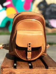 "Handmade Leather Backpack | Leather Rucksack | Womens Backpack | Mens Backpack | Small Travel Backpack | Personalization Gift | TiVergy Bag High quality genuine Italian leather and brass hardware brings true luxurious and vintage look. No matter it is empty or full, this backpack will always keep its shape. It`s perfect for everyday use, school, work or you can use it even as a travel bag for a short trip. Dimensions: Height 11.5\" (29cm) Width 8.75\" (22 cm) Thickness 4\" (10cm) There is outsi Brown Everyday Carry Backpack With Adjustable Strap, Leather Chest Bag Backpack For Everyday Use, Brown Leather Backpack With Adjustable Strap For Everyday, Leather Backpack With Waxed Finish For Everyday, Leather Adventure Backpack, Adventure Satchel Backpack With Leather Backing, Everyday Carry Backpack With Leather Lining, Brown Leather Backpack For Everyday Carry, Waxed Finish Satchel Backpack For Everyday Carry